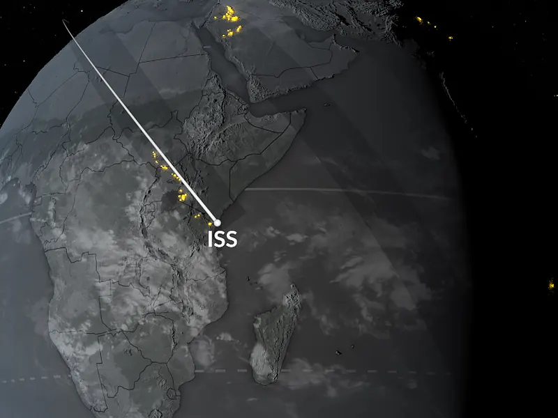 A world map with lightning shown as bright colours over the tropics and land